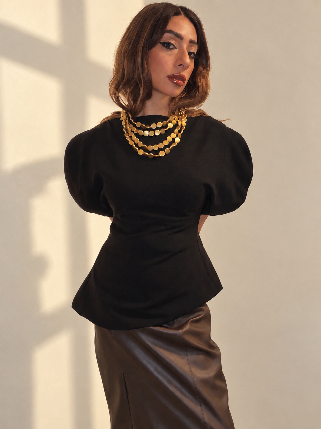 Tops | By Dina Heiba